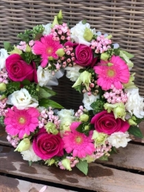 Pink wreath loose  stem tribute